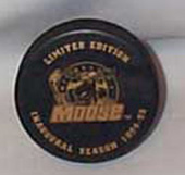 Minnesota Moose Inaugural Season Puck,94-95